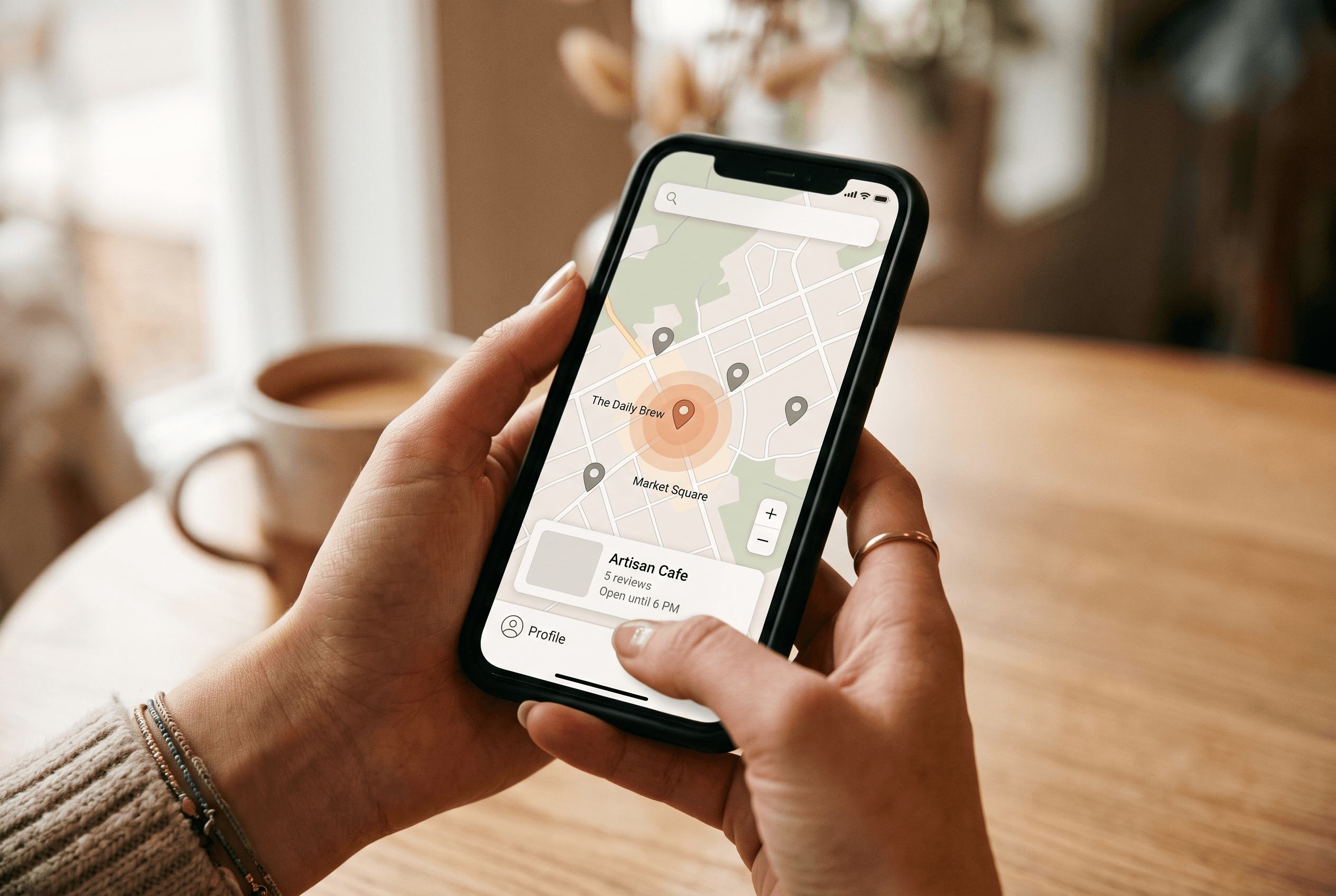 Close-up of a smartphone showing a local map with a single highlighted pin, illustrating how one Apple Maps ad appears per search result